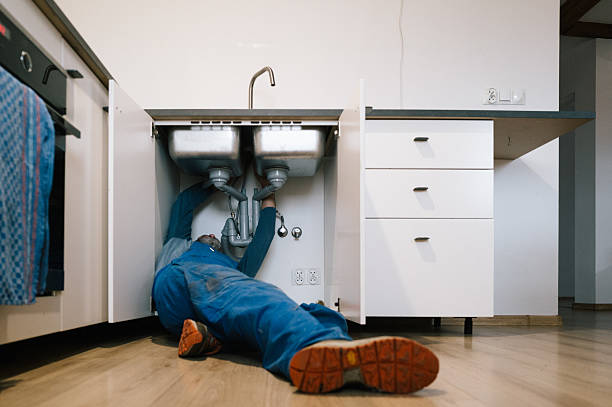 Professional Drain Cleaning technician working in Gans, OK